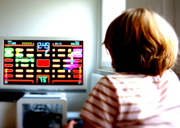 A Girl Playing Pac-Man in 2012