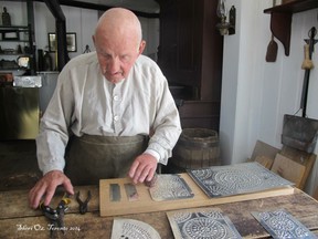 Tinsmith shows us materials ready to be made into a lamp